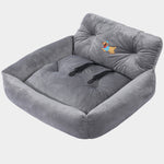 Gray pet bed with a cartoon dog design on a white background